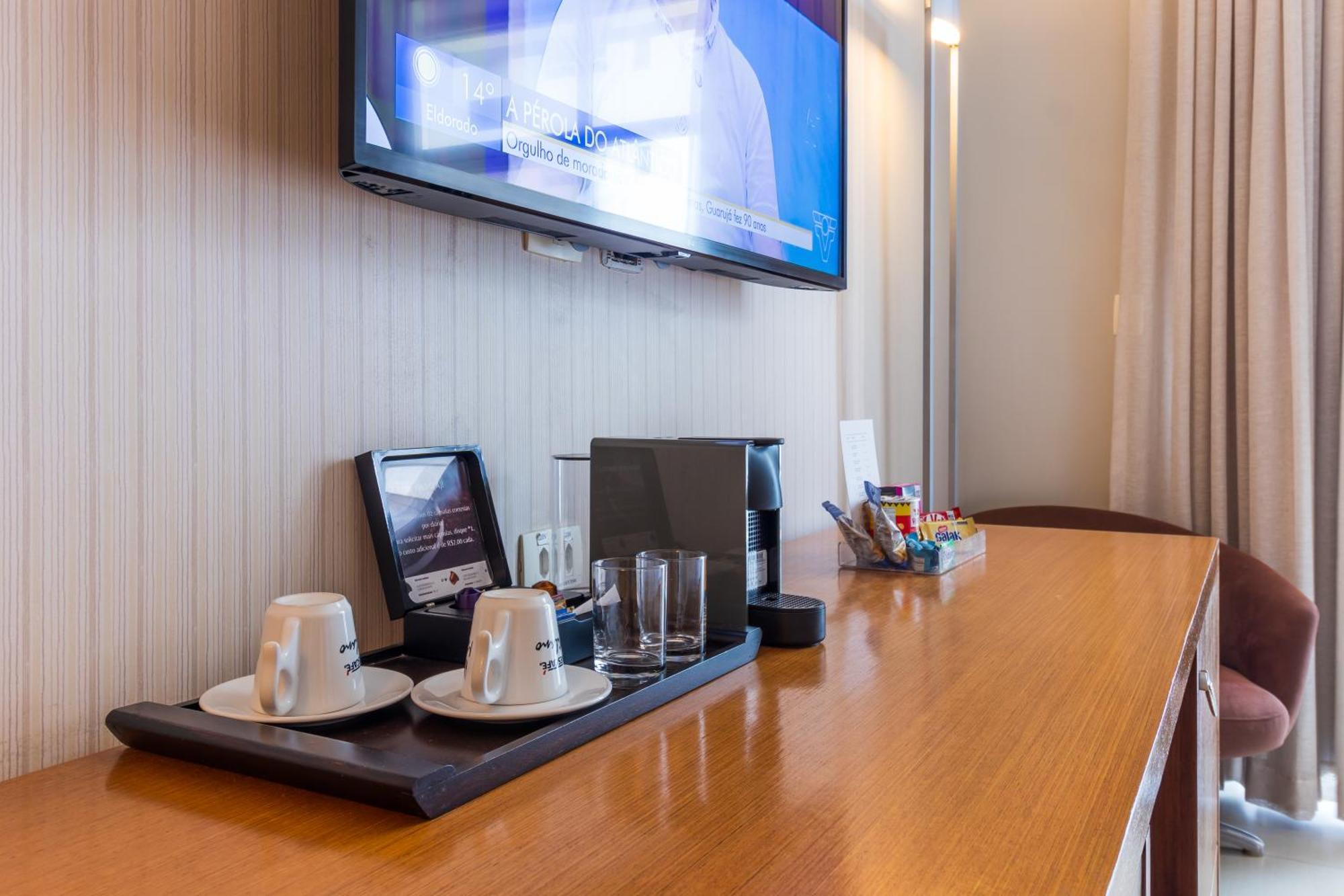 Parque Balneario Hotel Santos By Castelo Itaipava חדר תמונה A Nespresso machine in a hotel room